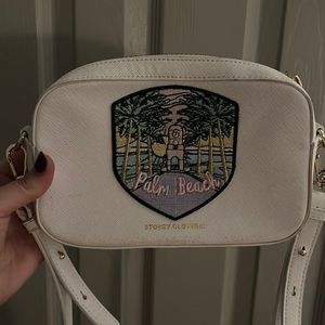 Stoney Clover Lane white crossbody bag (with palm beach patch and “z” patch)